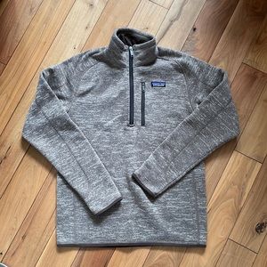 Patagonia 1/2 Zip, light brown color. Like new.